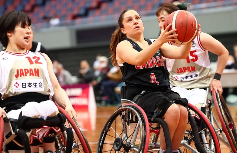 Rosie Lalonde is currently in possession of the ball. // Wheelchair Basketball Canada vs. Japan