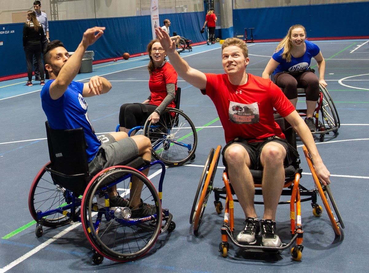 men playing wheelchair basketball
