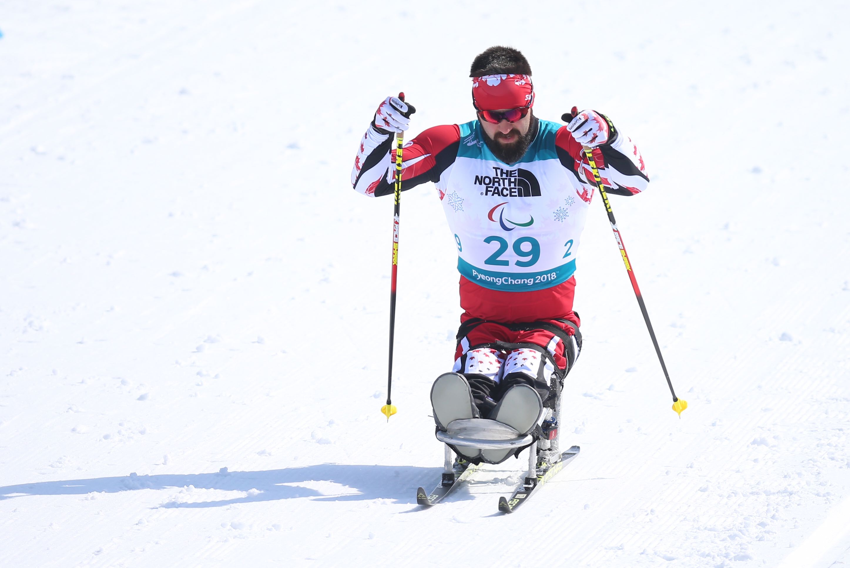 Collin Cameron in his sit ski race