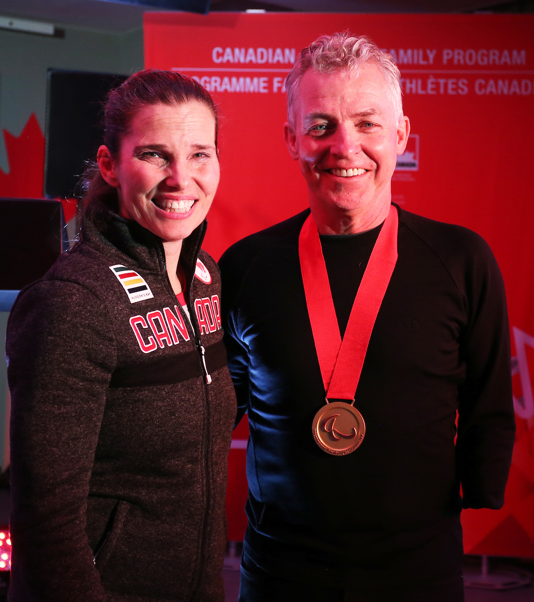 Patrick Jarvis with Kirsty Duncan, the Minister of Science and Sport for Persons with Disabilities after Patrick was inducted into the Paralympic Order  