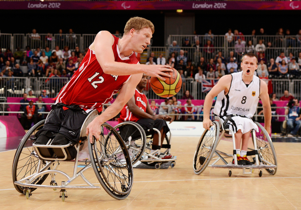 Patrick playing wheelchair basketball in London