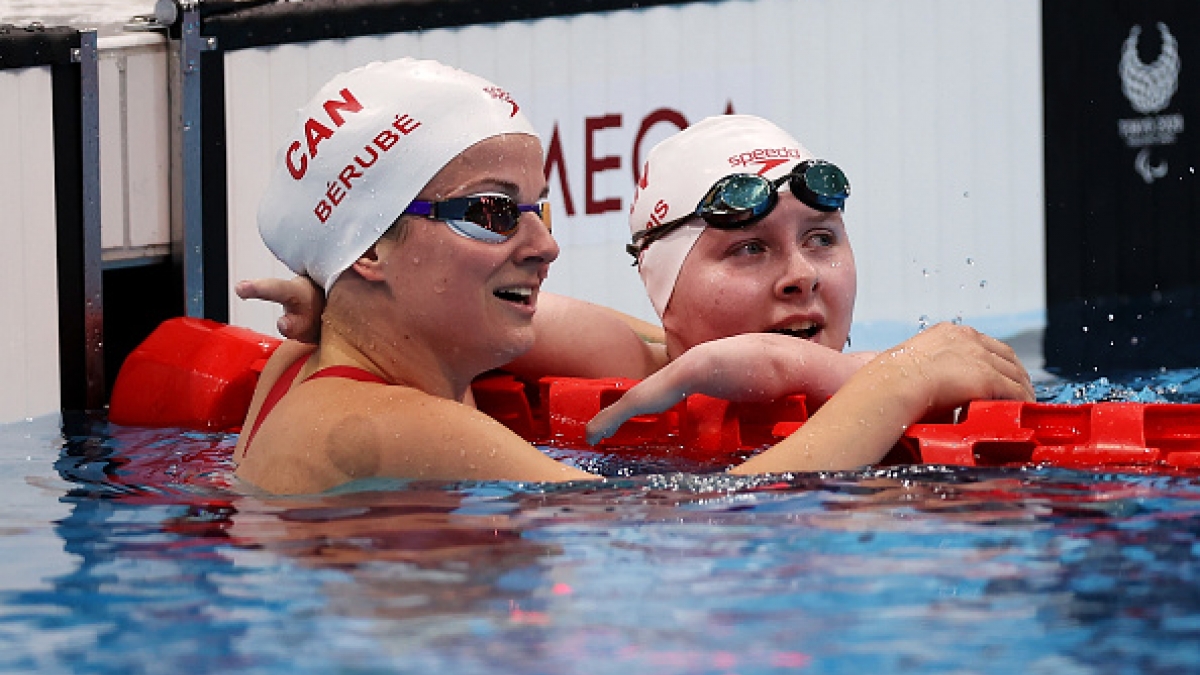 Danielle Dorris (right) reacting with fellow Canadian Camille Bérubé (left) after Dorris won her first medal at the Paralympic Games on Monday. 