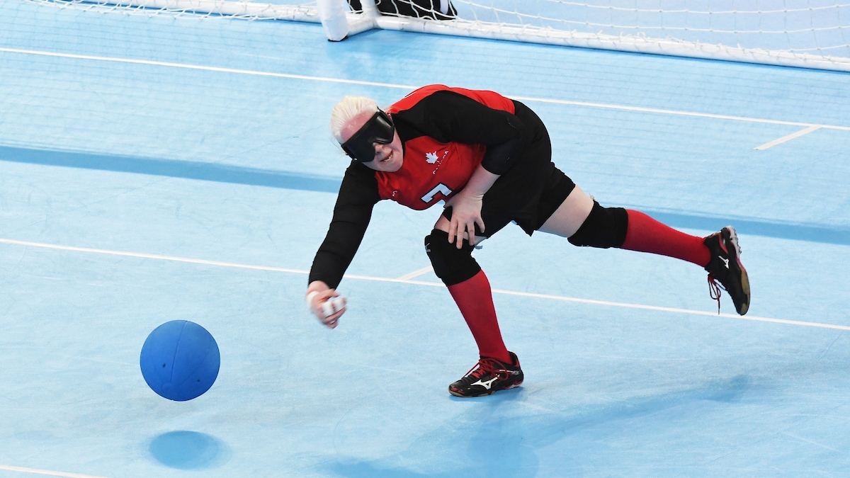 Amy Burk throws the ball in goalball competition at the Lima 2019 Parapan Am Games