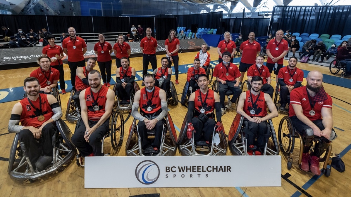 Canada's wheelchair rugby team photo with their silver medals at the 2022 Canada Cup