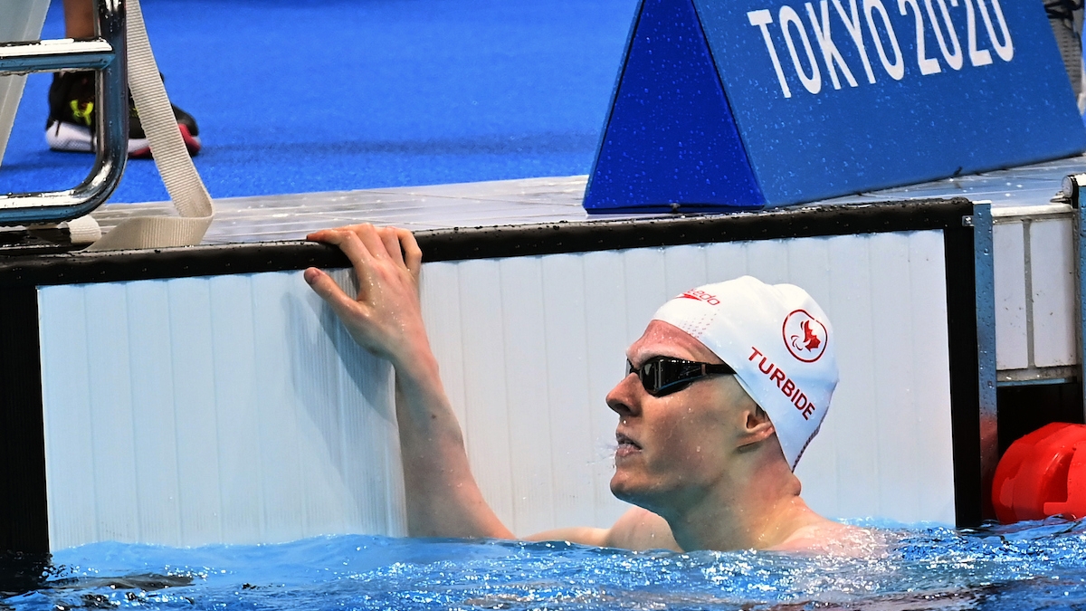Nicolas-Guy Turbide in the pool after a race at Tokyo 2020.