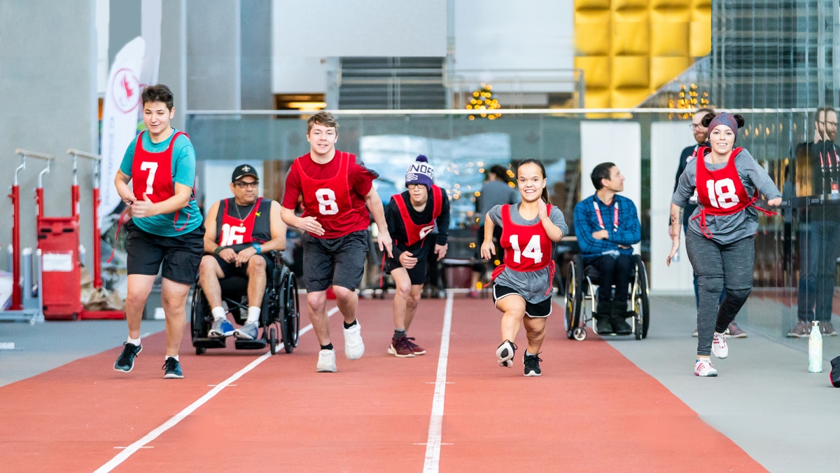 Athletes running at a Paralympian Search