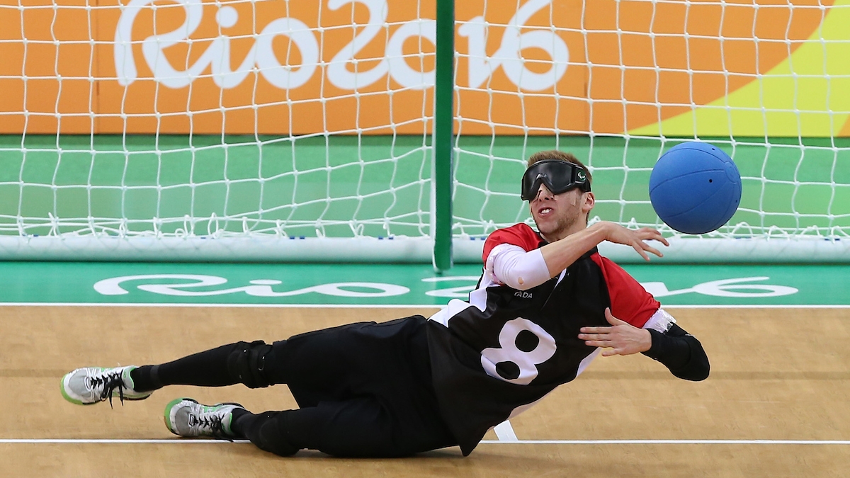 Simon Richard throws the ball in goalball action at Rio 2016. 