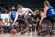 Arinn Young playing wheelchair basketball