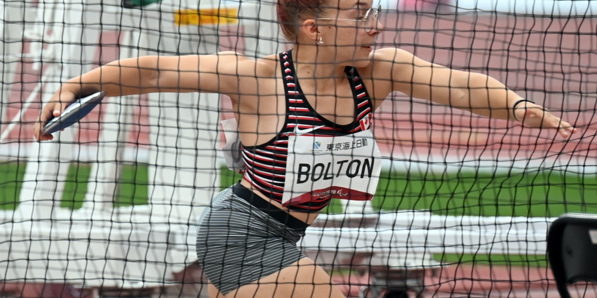 Charlotte Bolton competes in discus