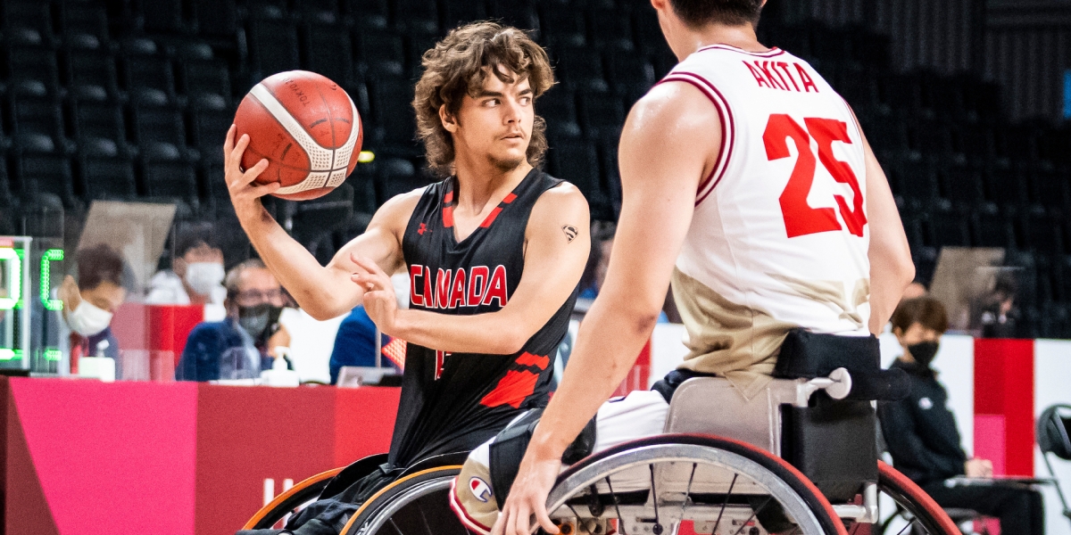 Garrett Ostepchuk plays wheelchair basketball
