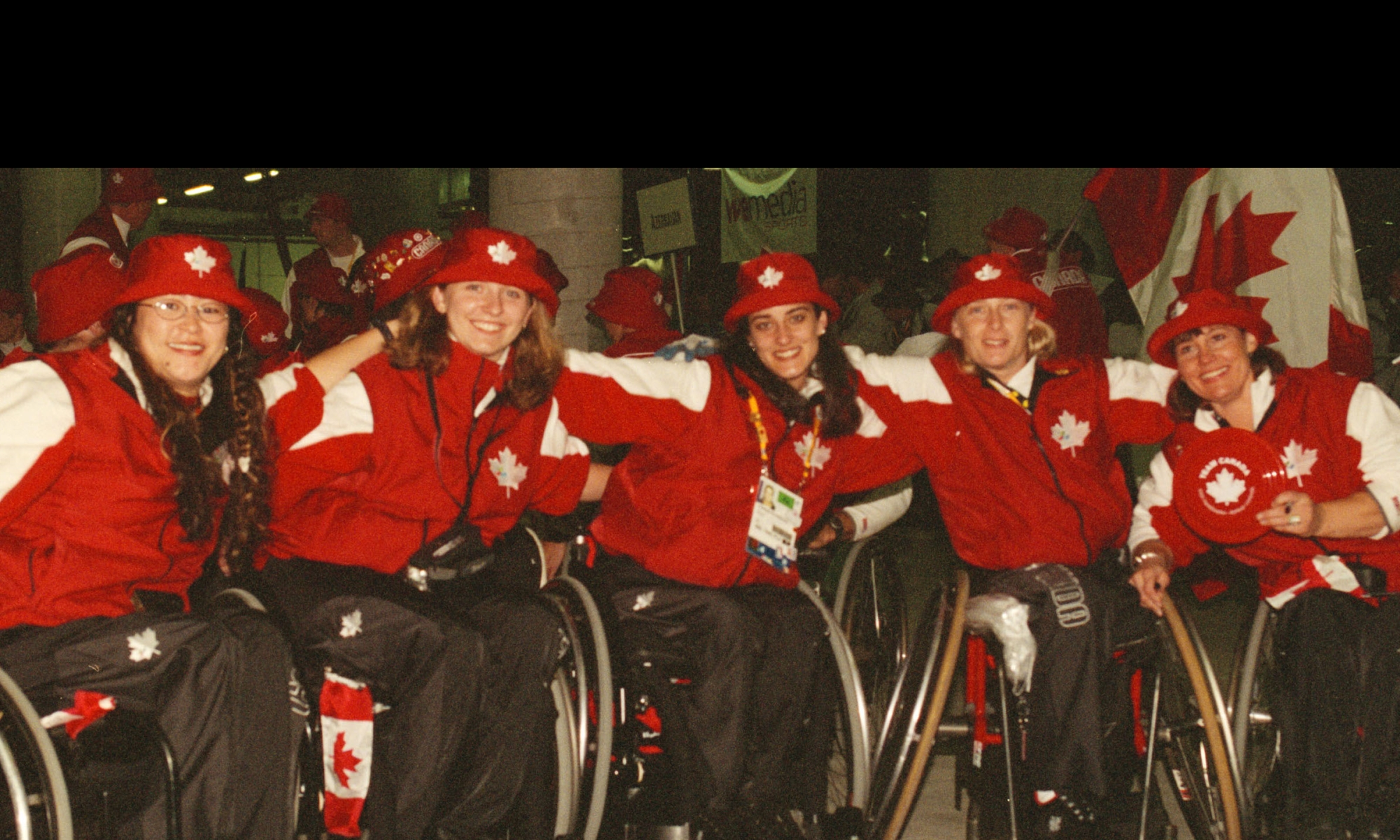 Athletes in wheelchairs and Canada gear from the Sydney 2000 Paralympic Games