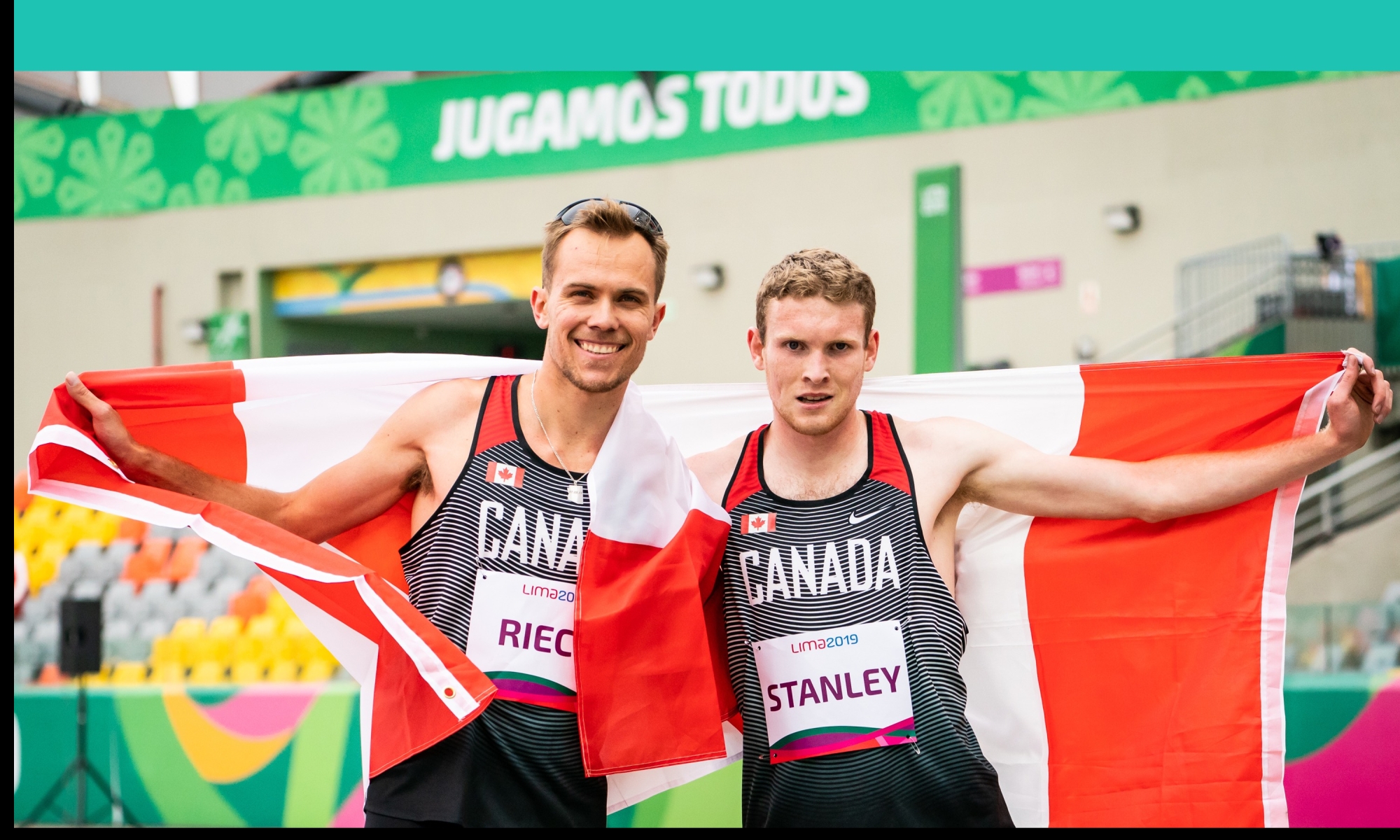 nate and liam holding the canadian flag