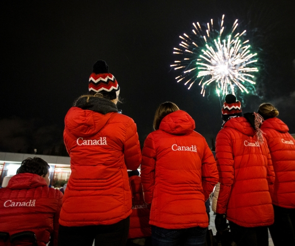Canadian athletes watch fireworks at the 2019 World Para Nordic Skiing Championships Opening Ceremony. 