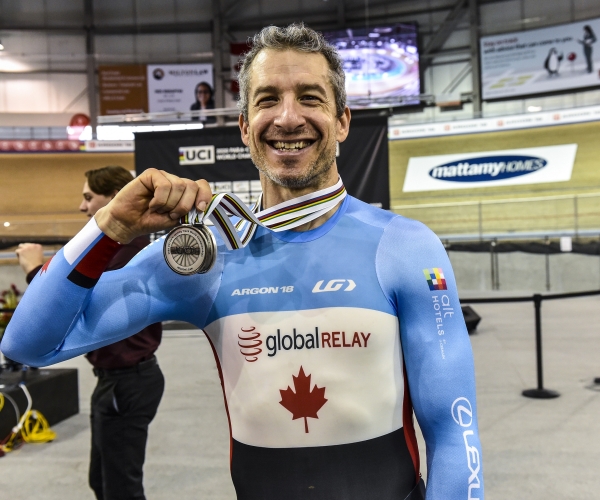 Tristen Chernove smiles holding up his two silver medals won on day three at the Para Cycling Track World Championships. 