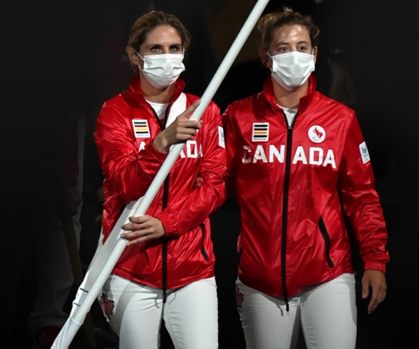 Para judoka Priscilla Gagné (Sarnia, ON) carries the flag for Canada at the Opening Ceremony on August 24, alongside guide and training partner Laurie Wiltshire (Calgary, AB).