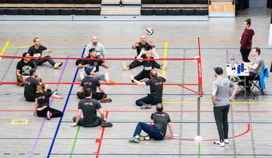 People playing sitting volleyball at the ParaTough Cup