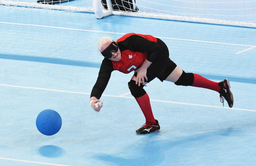 Amy Burk throws the ball in goalball competition at the Lima 2019 Parapan Am Games