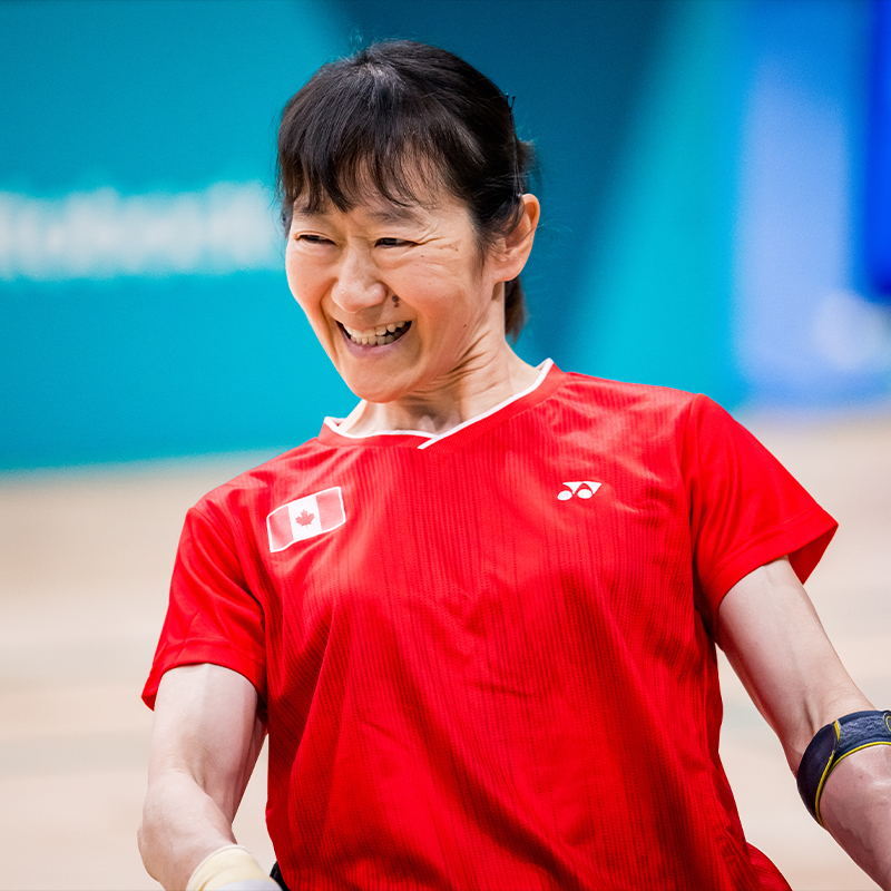 Canadian Para badminton player Yuka Chokyu smiles during a match at the Santiago 2023 Parapan American Games.