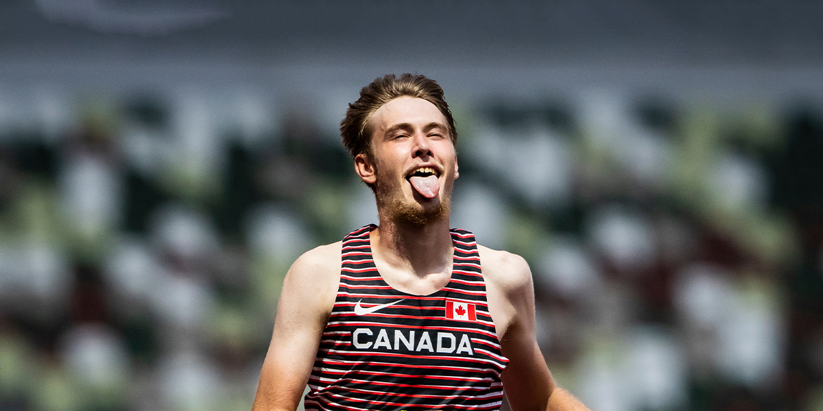 Canadian runner Zachary Gingras celebrates crossing the line at the Tokyo 2020 Paralympics by sticking out his tongue in celebration.