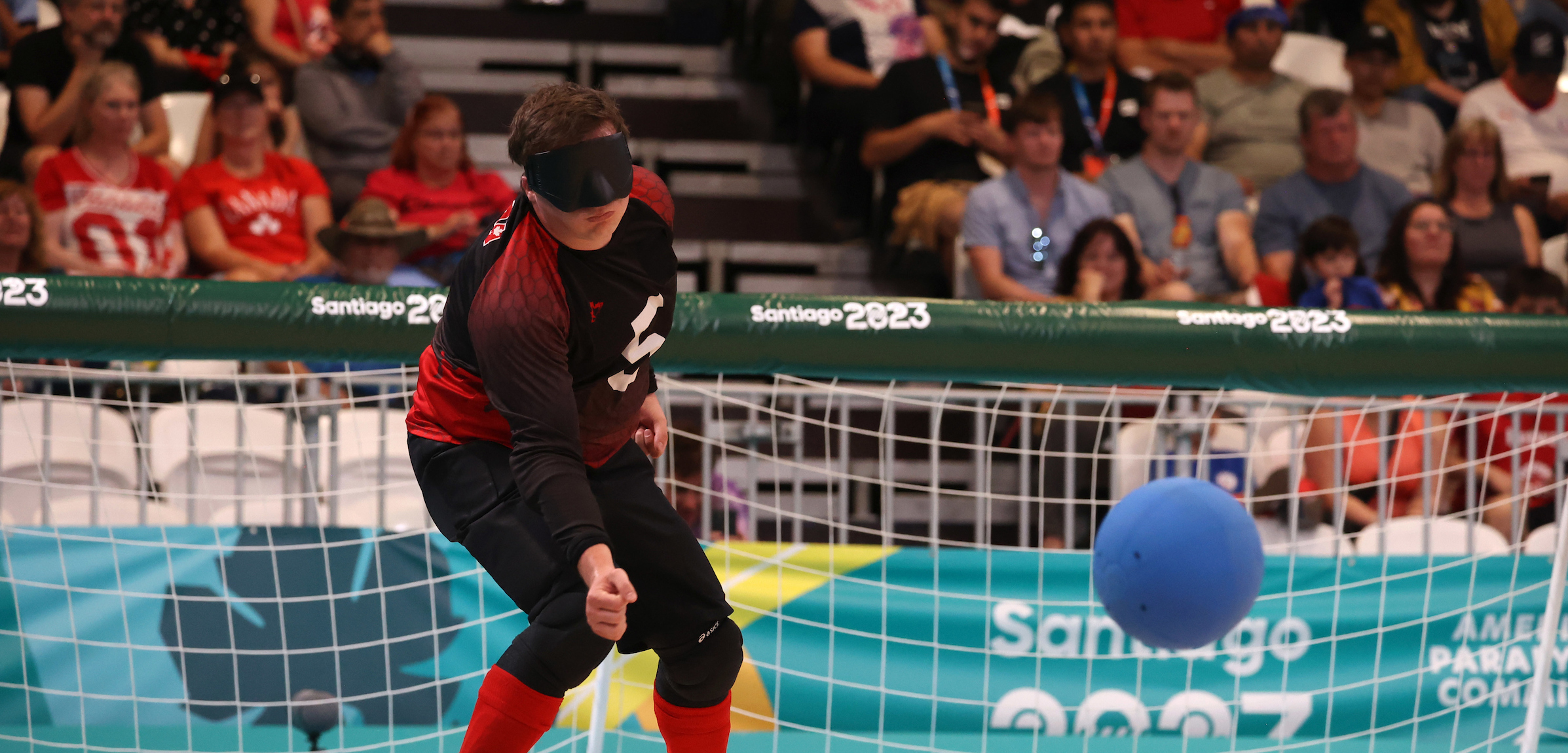 Canada’s Aaron Prevost play the ball against Chile during the Goalball quarter finals in Santiago 2023 Parapan American Games at the Centro de Deportes Paraolimpicos of Estadio Nacional on November 22 in Santiago, Chile