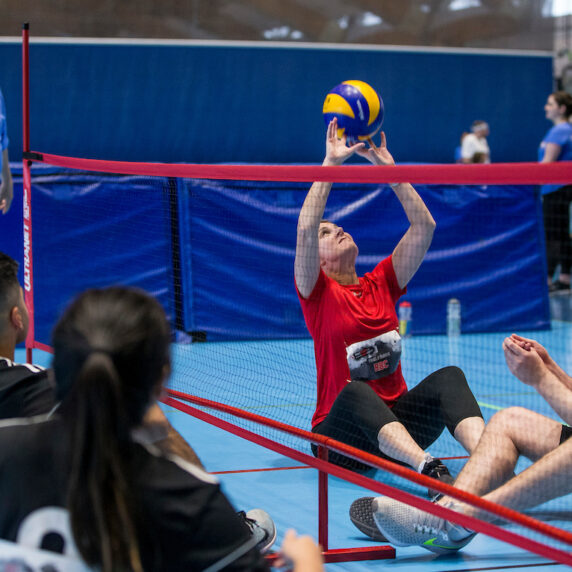 ParaTough Cup participants compete in sitting volleyball.