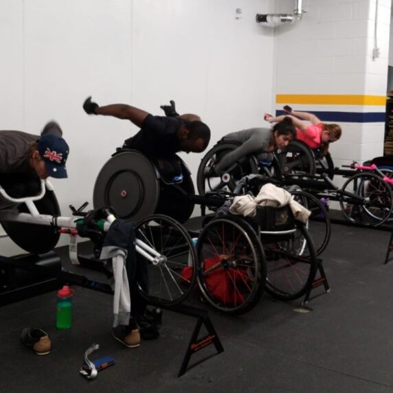 Cruisers Sports wheelchair racers in their chairs.