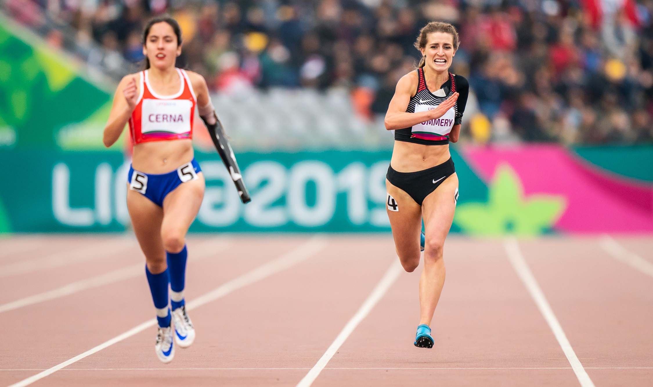 Amanda Rummery running on the track at Lima 2019