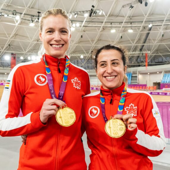 Carla Shibley (right) and her pilot Meghan Lemiski (left) with their gold medals.