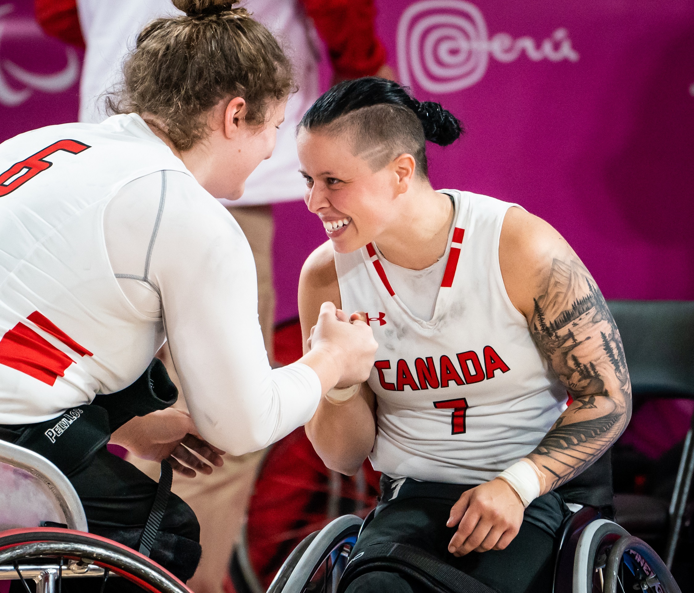 Cindy Ouellet and Arinn Young celebrate after winning the semifinals