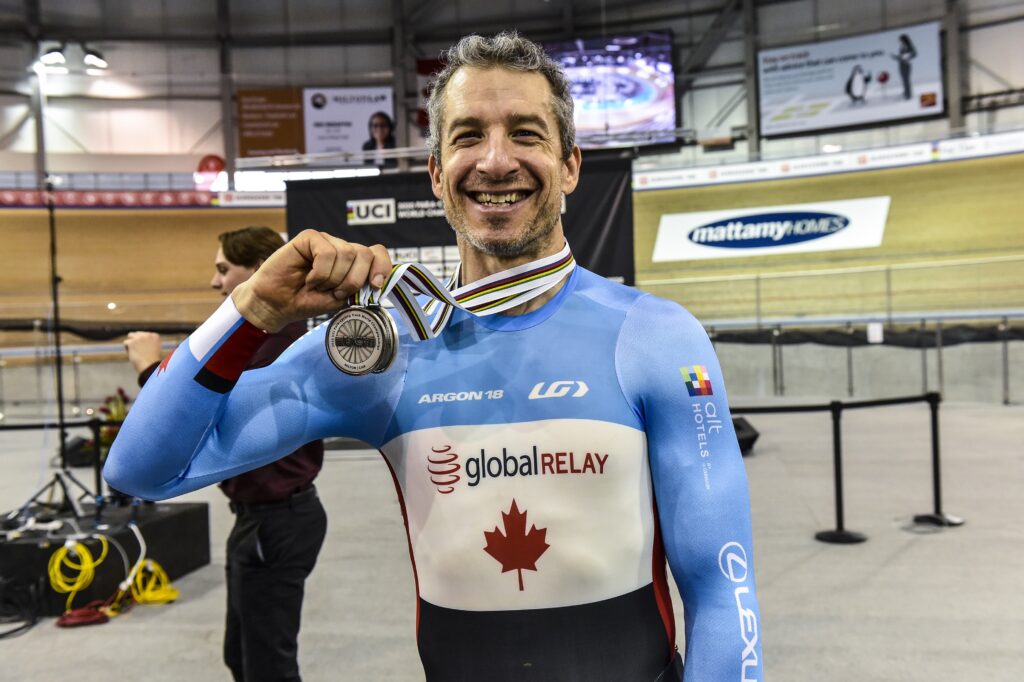 Tristen Chernove smiles holding up his two silver medals won on day three at the Para Cycling Track World Championships.