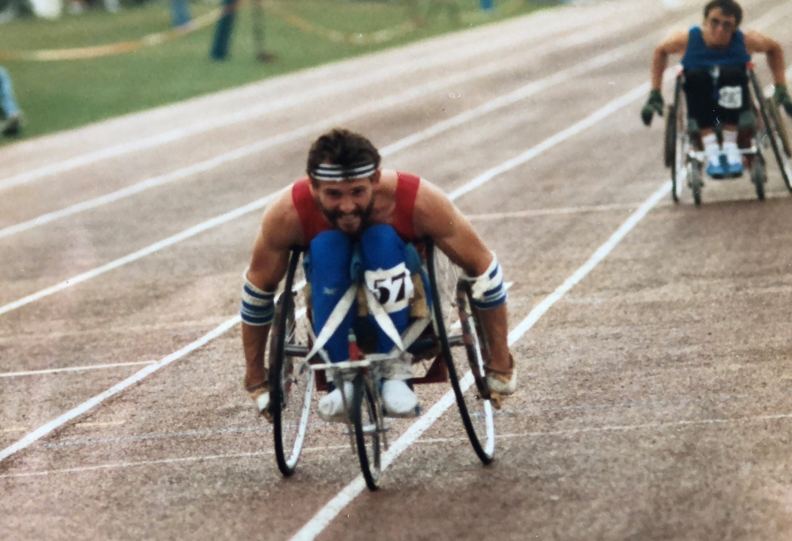 Paralympian Paul Clark competes in a wheelchair race.