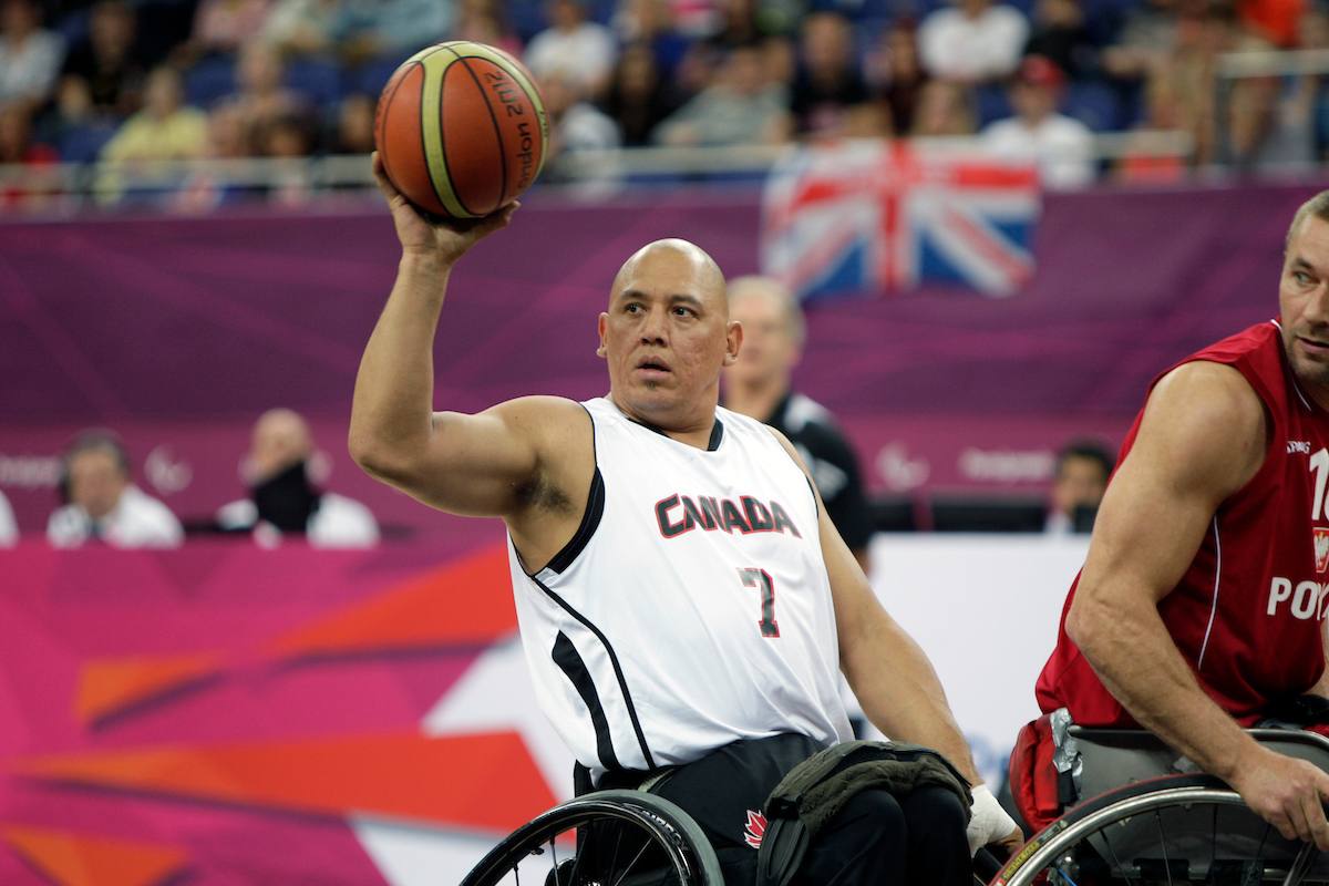 Richard Peter throwing a basketball in competition at the London 2012 Paralympic Games