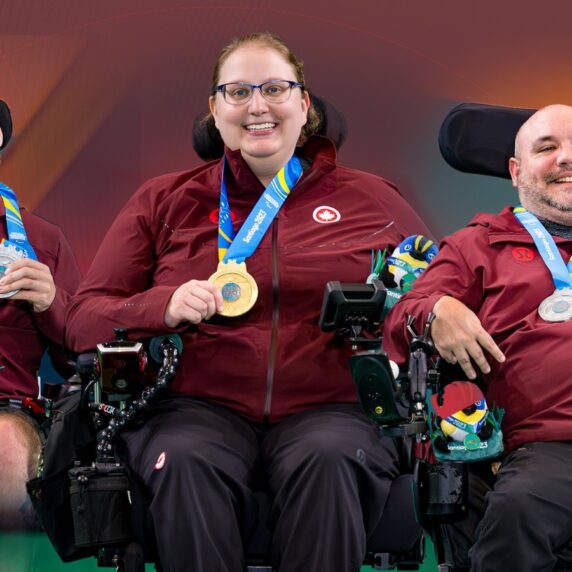 Danik Allard with his silver, Alison Levine with her gold, Lance Cryderman with his silver medal