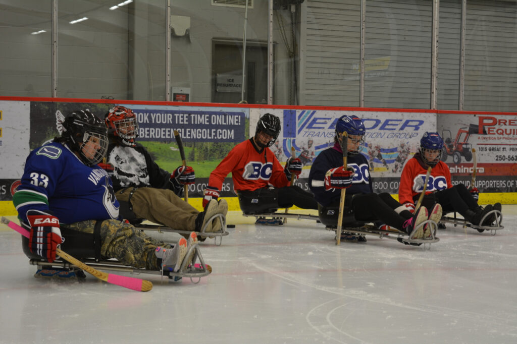 Northern Adapted Sports Association participants at a Para ice hockey session.
