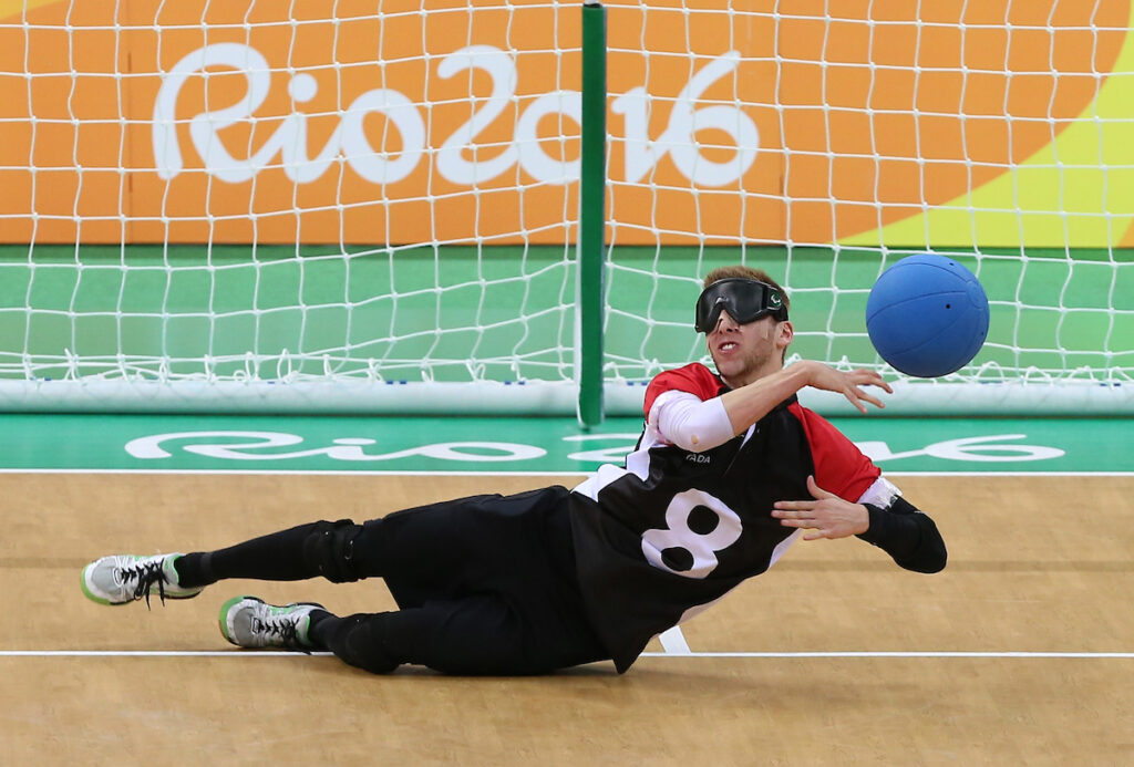 Simon Richard throws the ball in goalball action at Rio 2016.