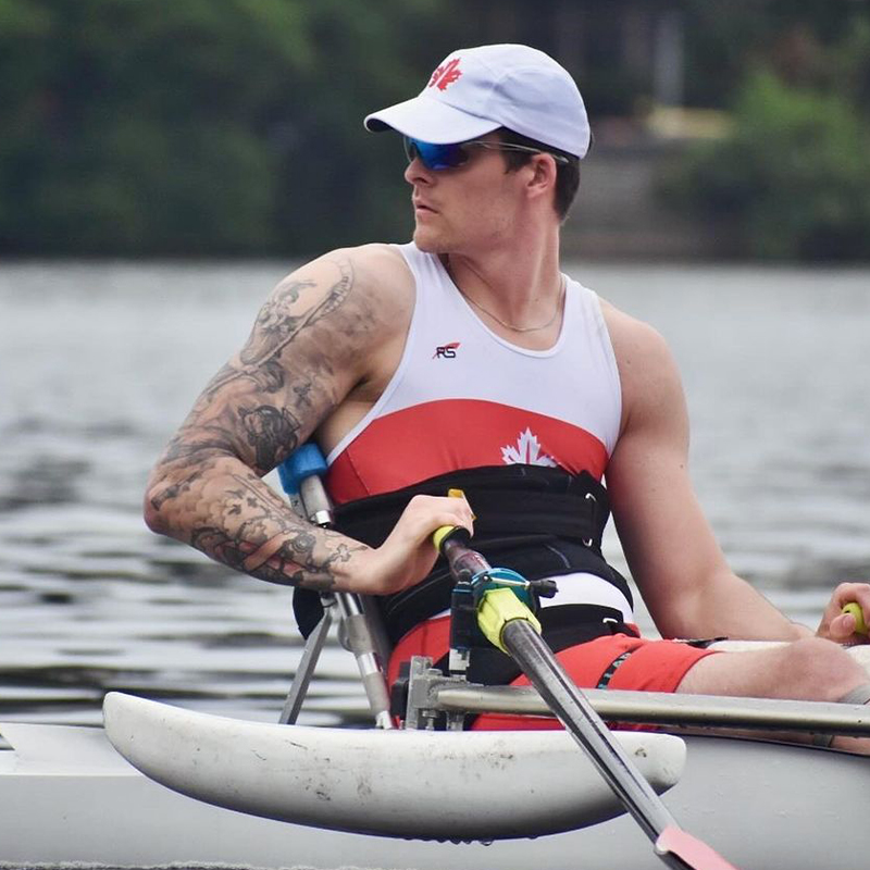 Canadian Para rower Jacob Wassermann navigating his boat.