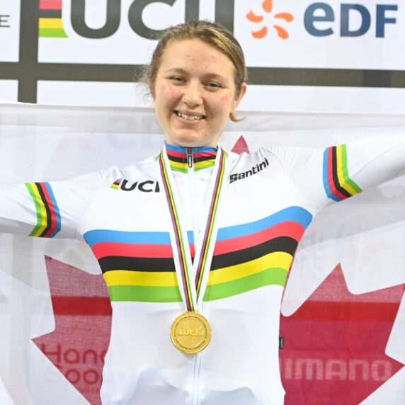 Canadian Para cyclist Mel Pemble celebrates after winning gold at the 2022 Para Cycling Track World Championships.