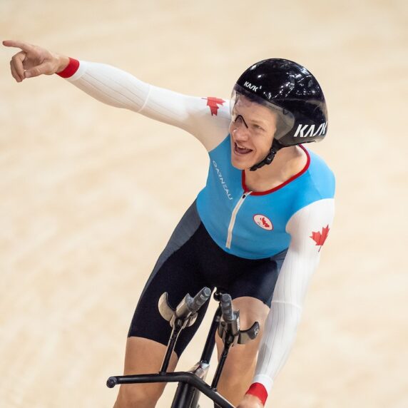 Alexandre Hayward celebrates following his bronze medal race