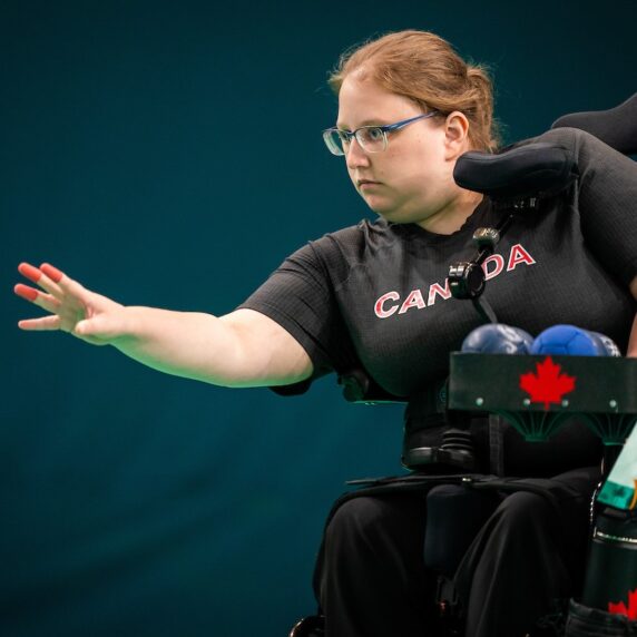 Alison Levine tossing a ball in competition, boccia