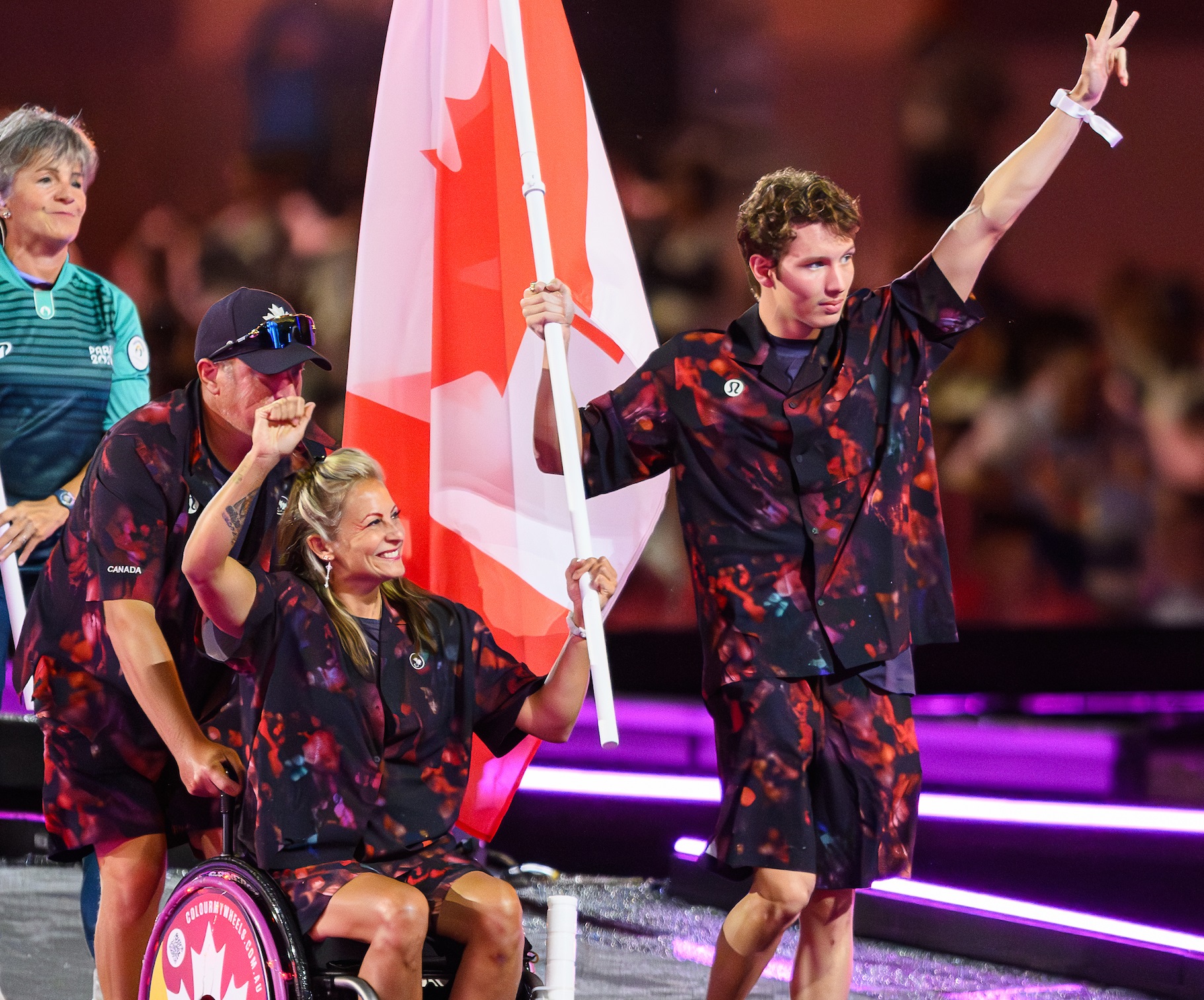 canada's closing ceremony flag bearers walking into the ceremony