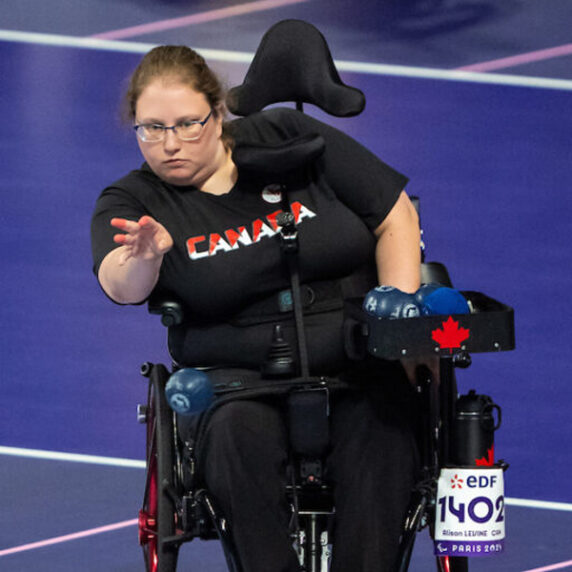 Alison Levine tossing a ball in competition, boccia