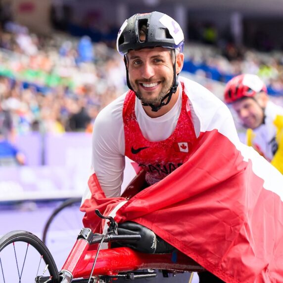 Cody Fournie smiling after winning the Men’s 200m – T51 Final