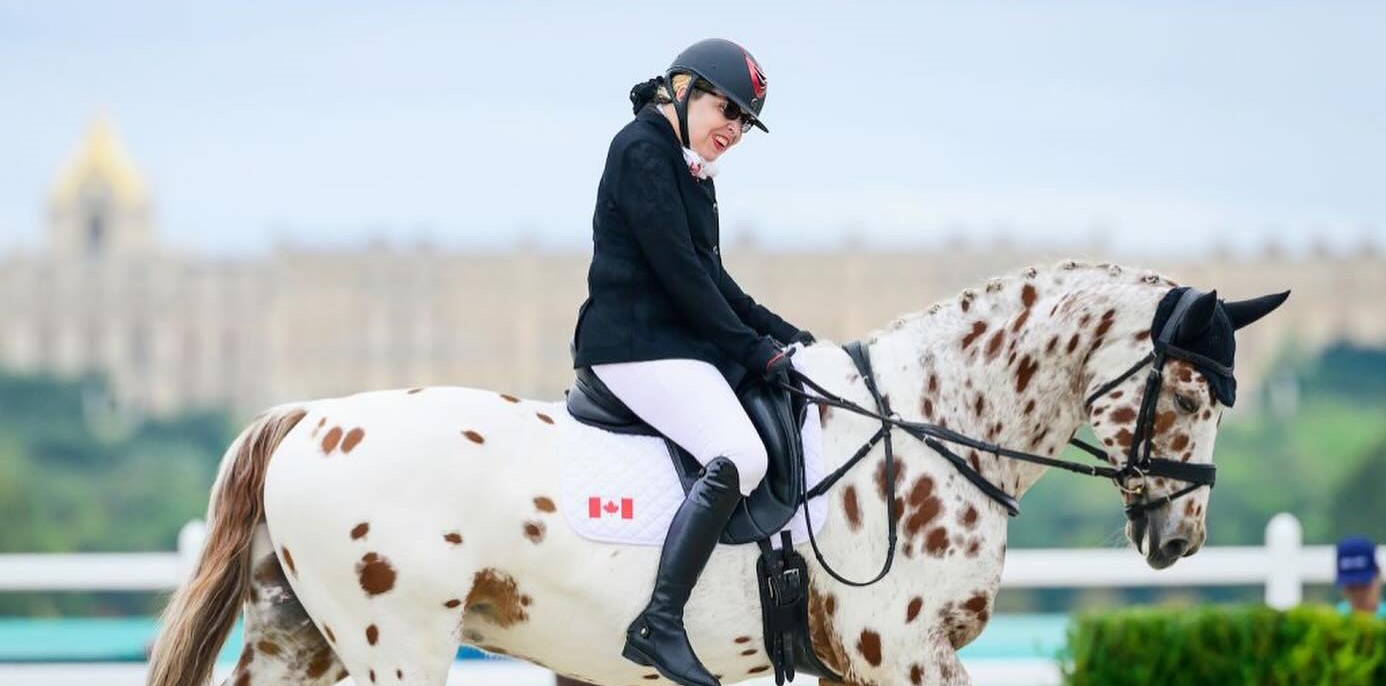 Jody Schloss riding her horse El Colorado