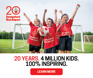 Four happy children in red Jumpstart t-shirts cheer and hold a soccer ball in front of two goals. Text: “20 YEARS. 4 MILLION KIDS. 100% INSPIRING.”