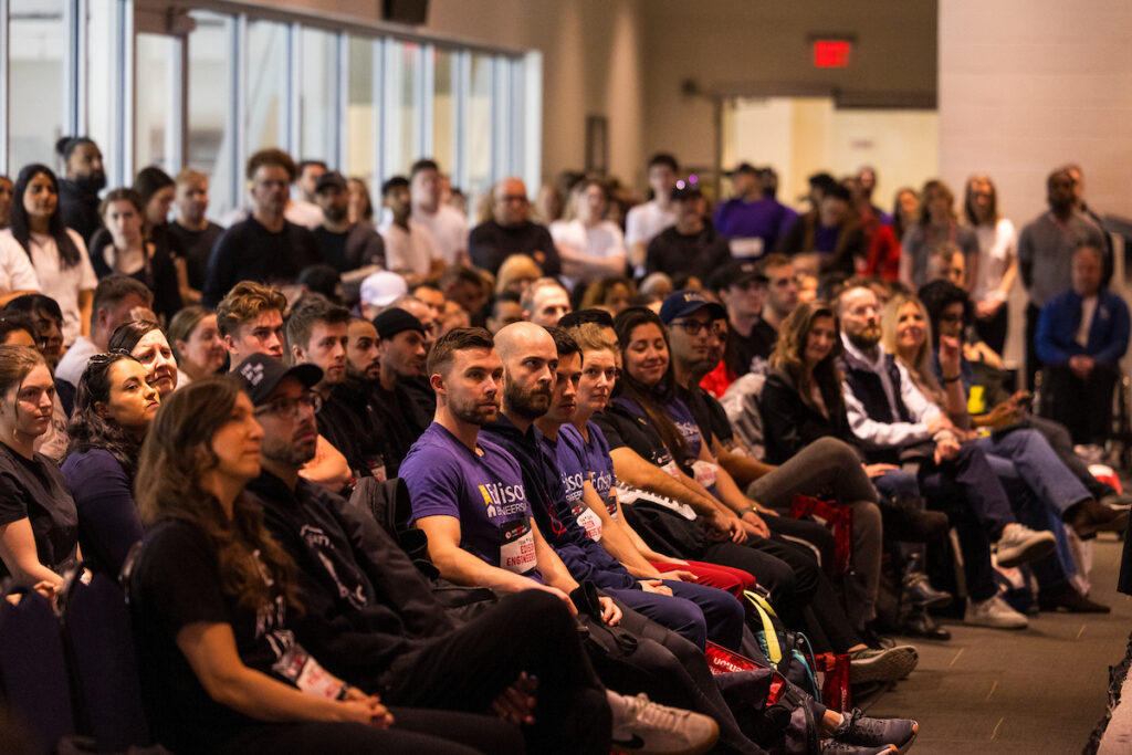 Participants at ParaTough Cup listening to a speaker. 