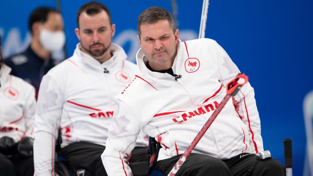 Mike Ideson looking down the ice during competition