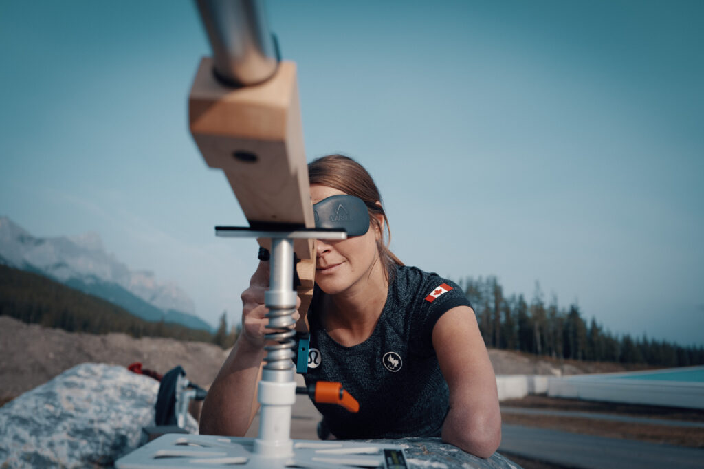 Brittany Hudak aims her biathlon rifle