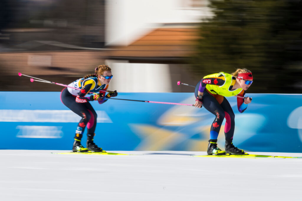 Two nordic skiers racing