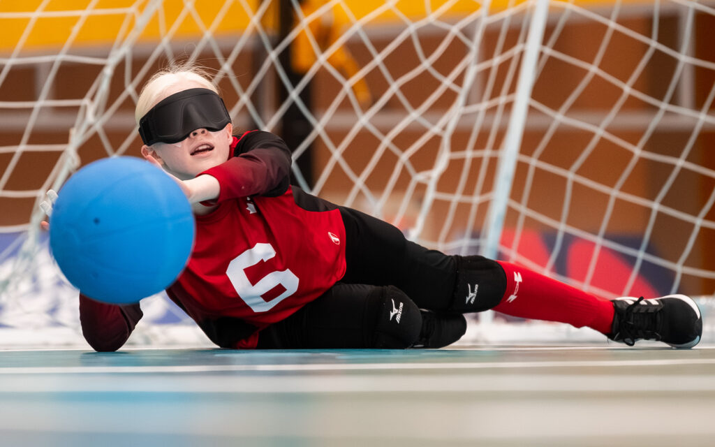 Goablball player diving for a ball